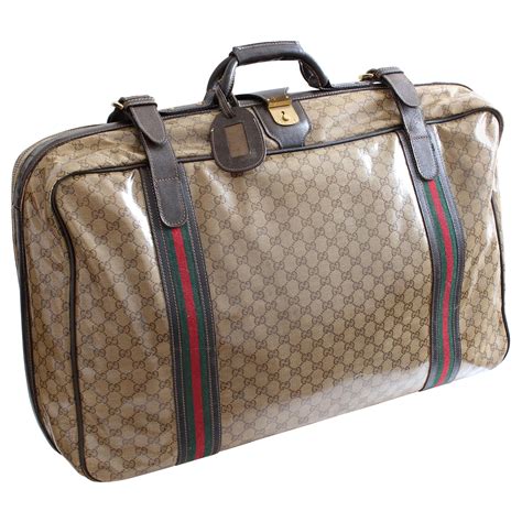 gucci leather logo suitcase|Gucci suitcase with wheels.